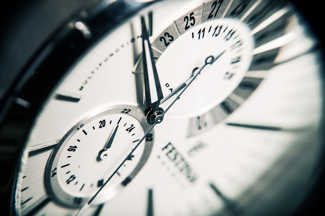 A close up of a watch, with the time ticking away...